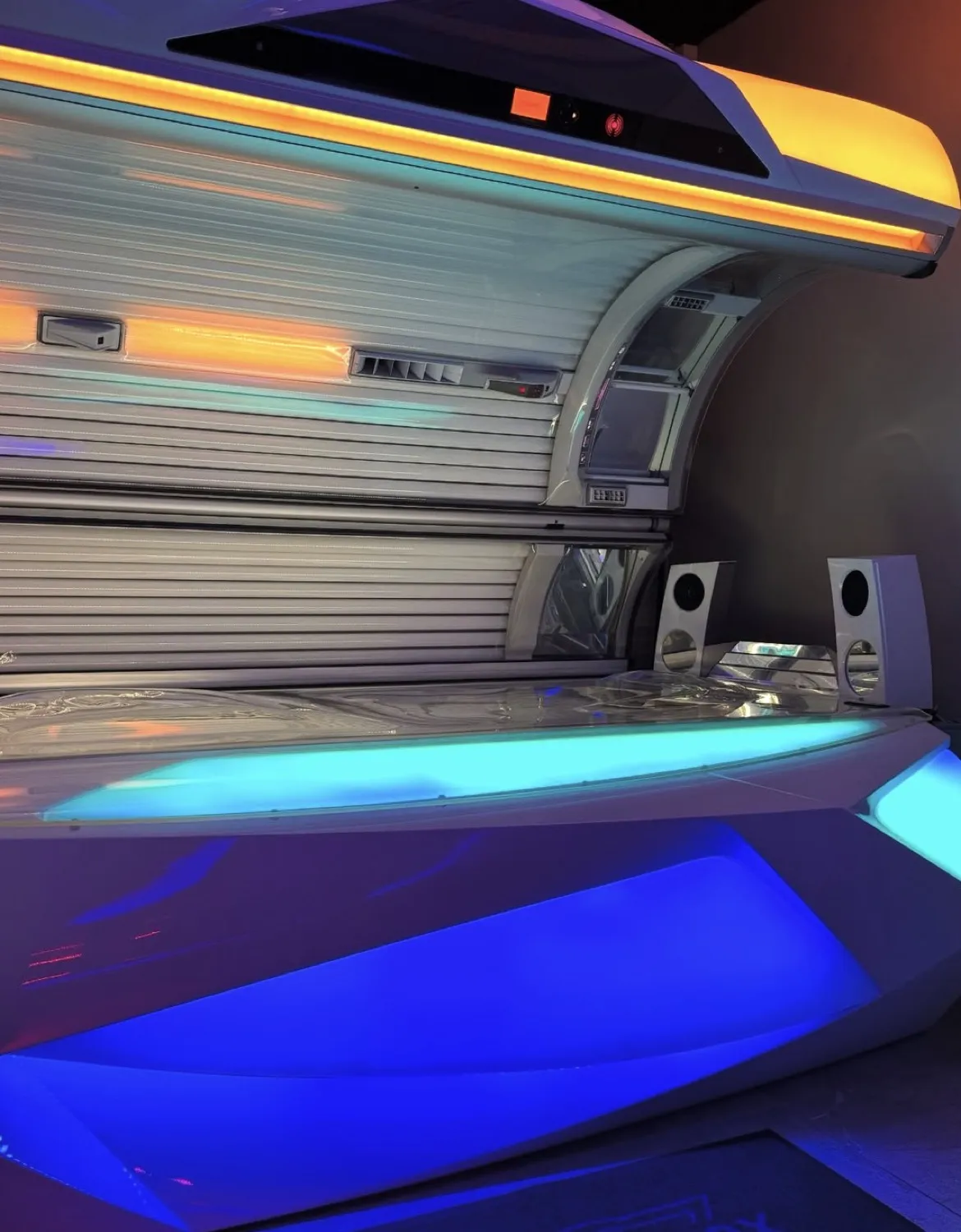 Ergoline Prestige sunbed with ambient lighting at Equinox Tanning Studio